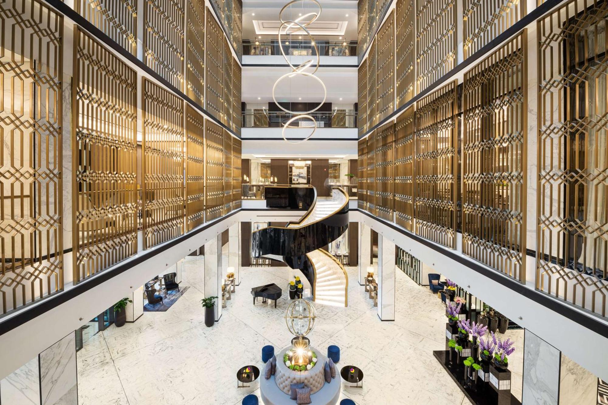 Hotel Waldorf Astoria Kuwait Kuwait City Exterior foto The hotel's lobby